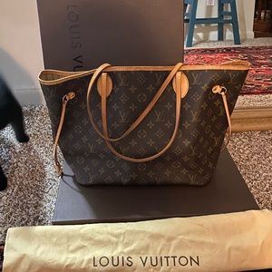 Louis Vuitton neverfull, mm, very well used, over 10 years old.